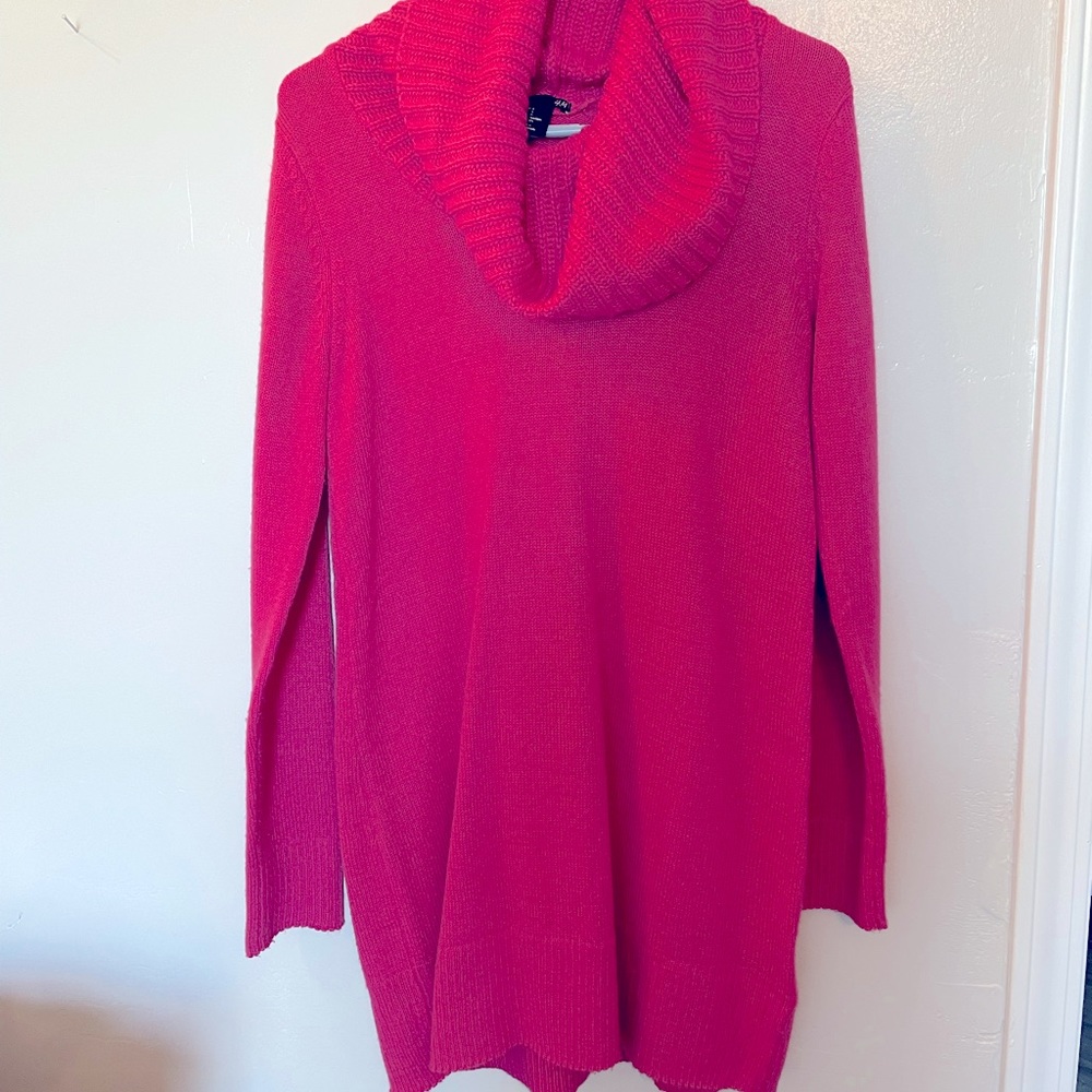 Hot pink long sweater with cowl neck.